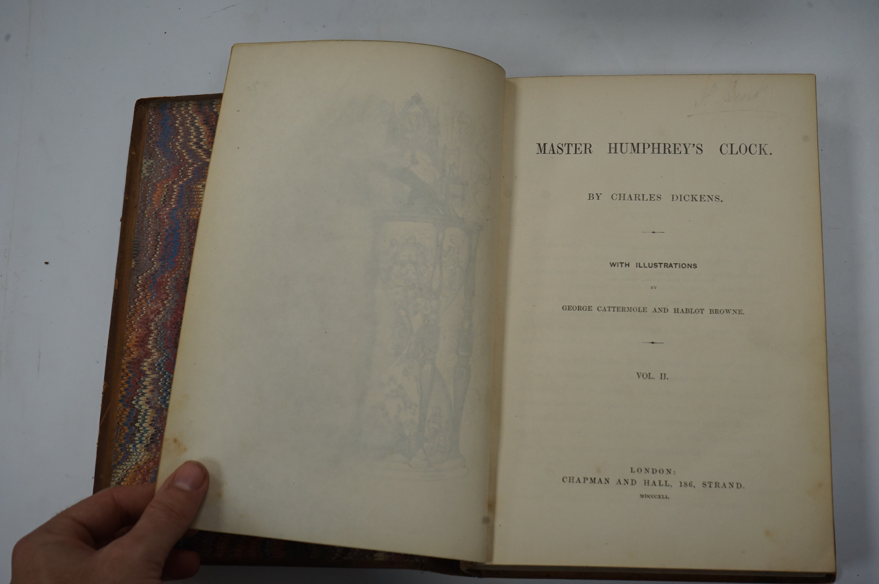 Dickens, Charles - Our Mutual Friend. (new edition), 2 vols. (bound together). pictorial general title, frontispieces and 38 plates; contemp. half calf and marbled boards, gilt decorated panelled spine with red and brown